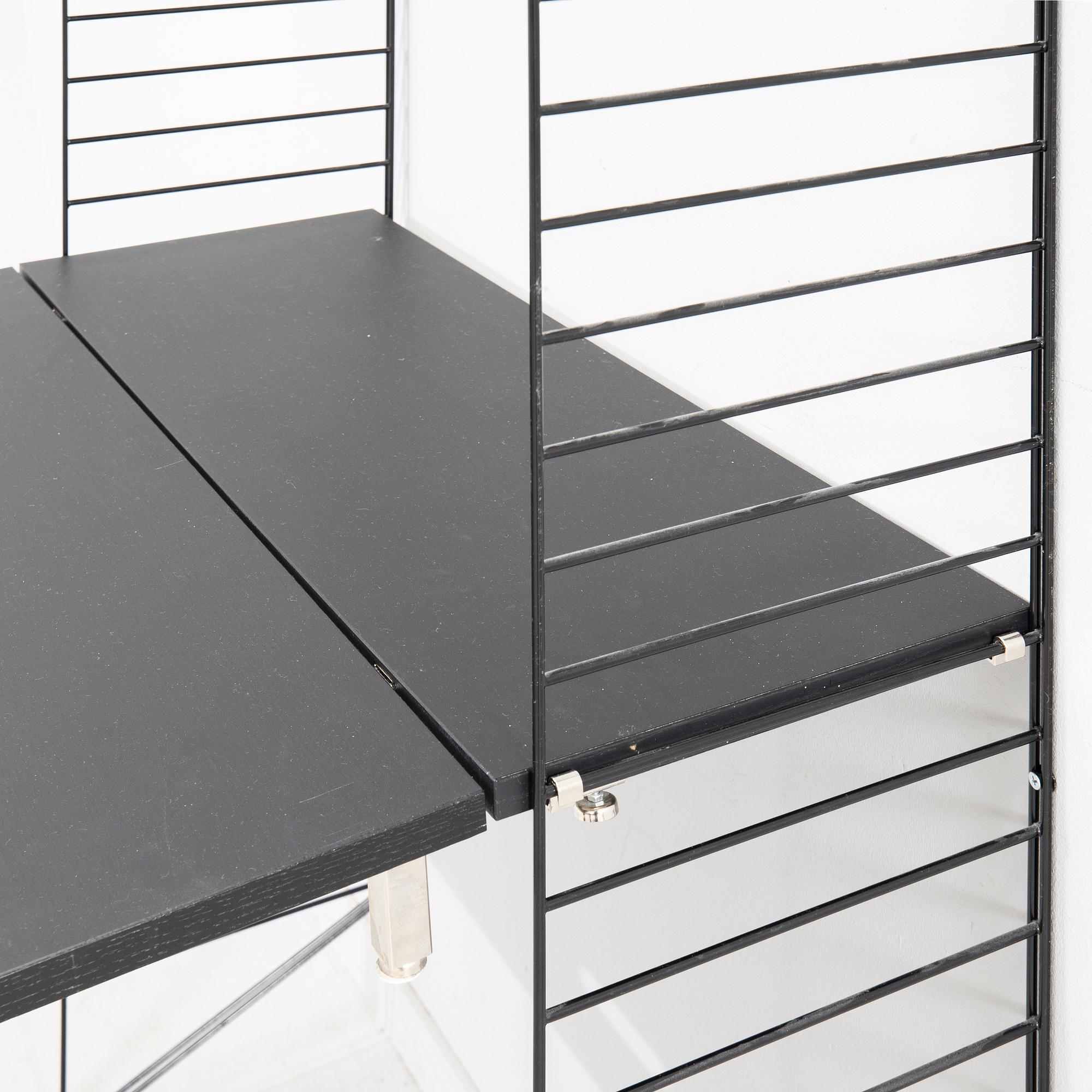 Nils Strinning, Hyllsystem.