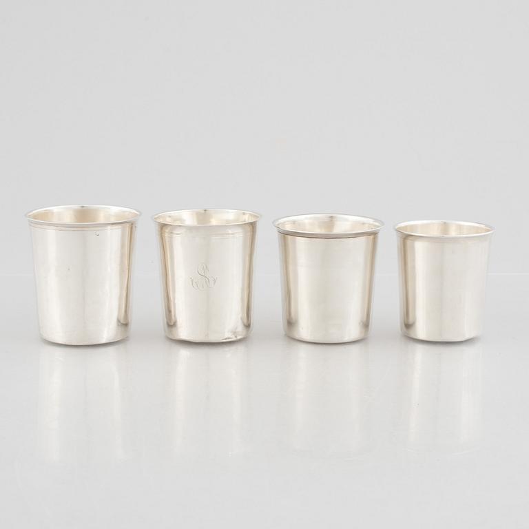Four French silver beakers, Paris, 19th Century.