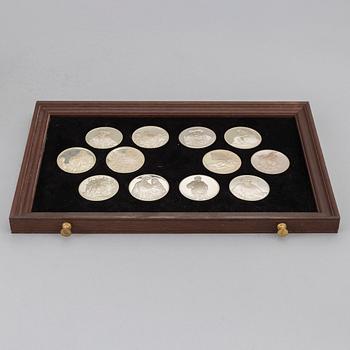 A set of 50 Sterling silver medals from Franklin Mint.