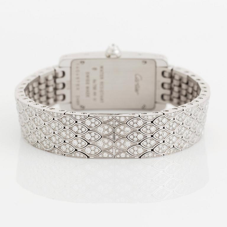 A Cartier "Tank Américane" 18K white gold watch set with round brilliant-cut diamonds.
