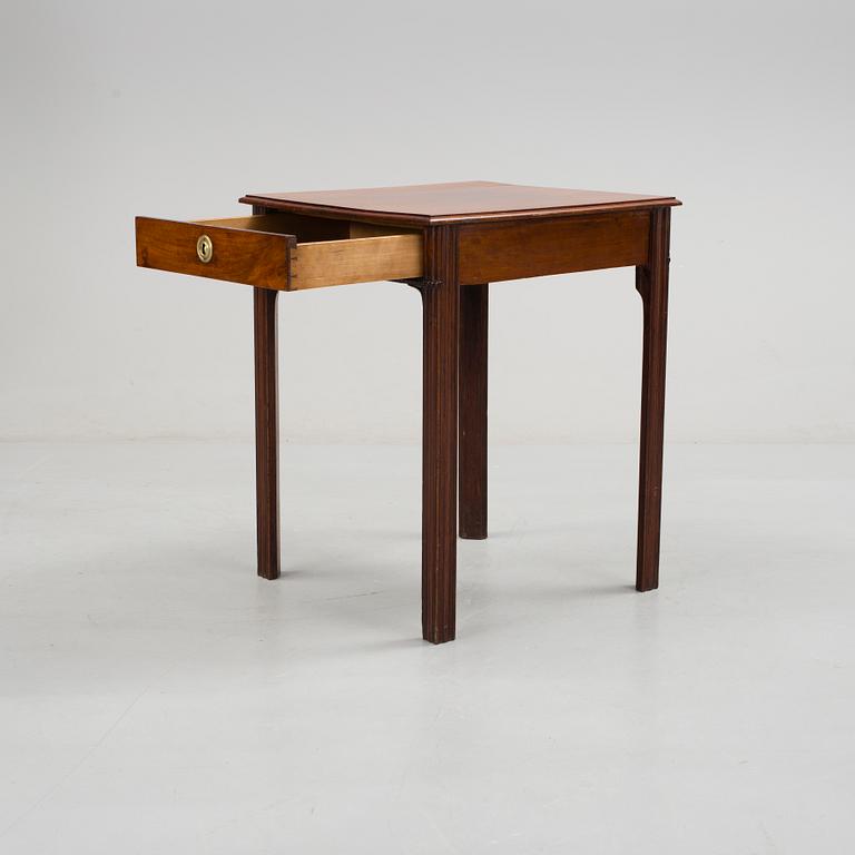 A early 19th century mahogany table.