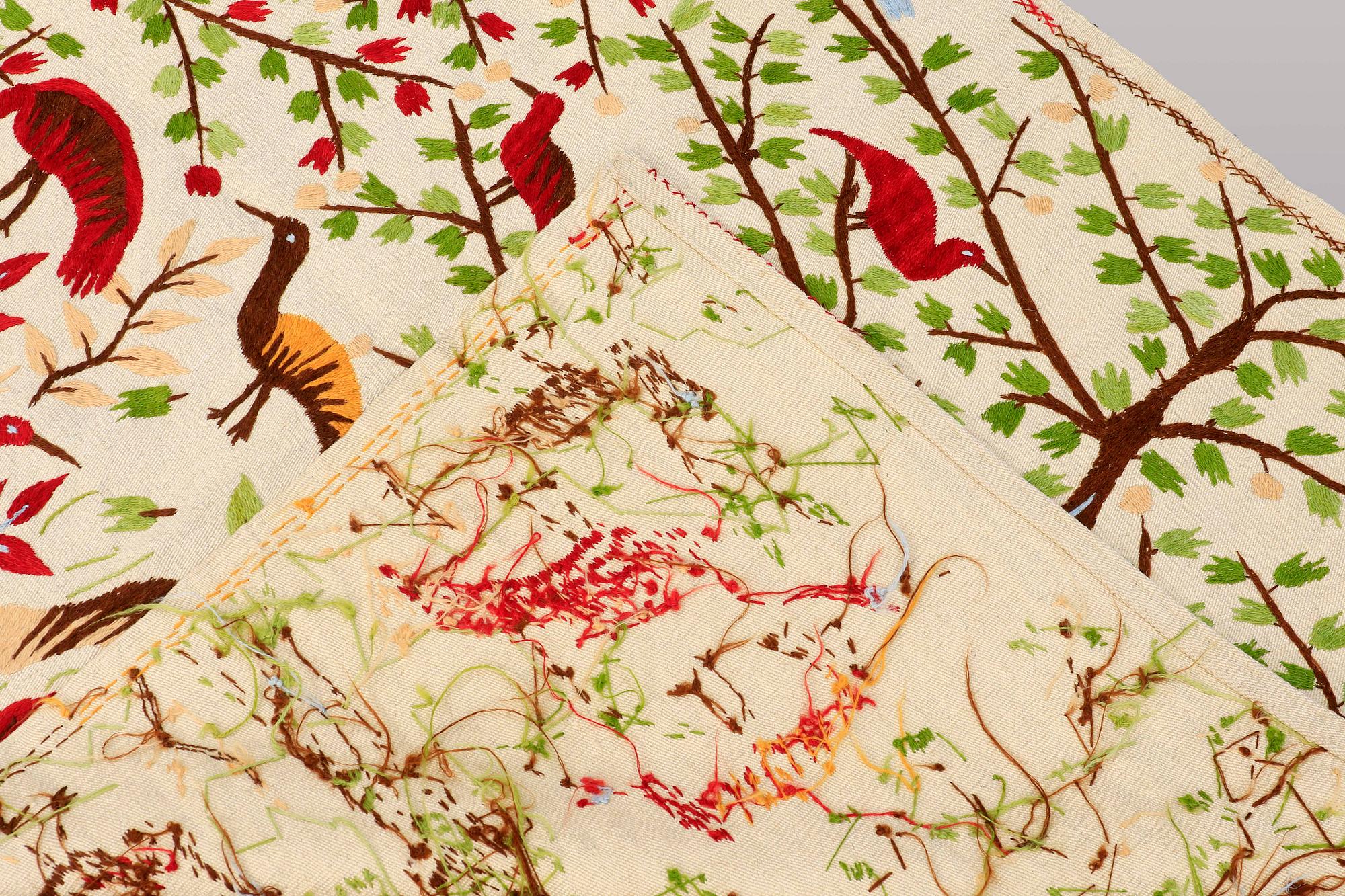 A RUG embroided flat weave, ca 171 x 121 cm.