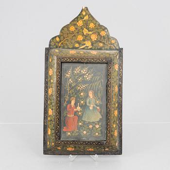A figure scene in a richly decorated frame, Persia, first half of the 20th century.