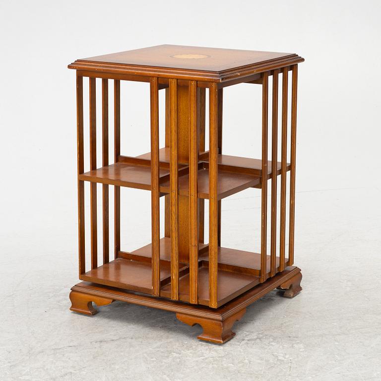 A revolving bookcase, late 20th century.