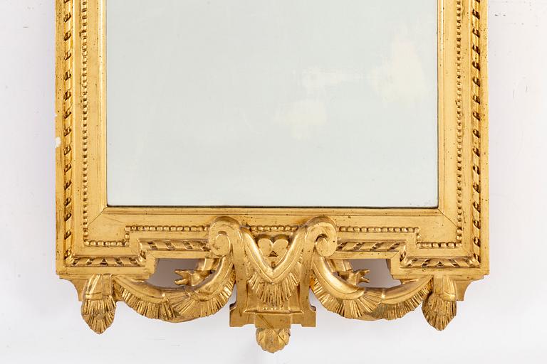 A Gustavian 18th century mirror by J Åkerblad, master 1758.