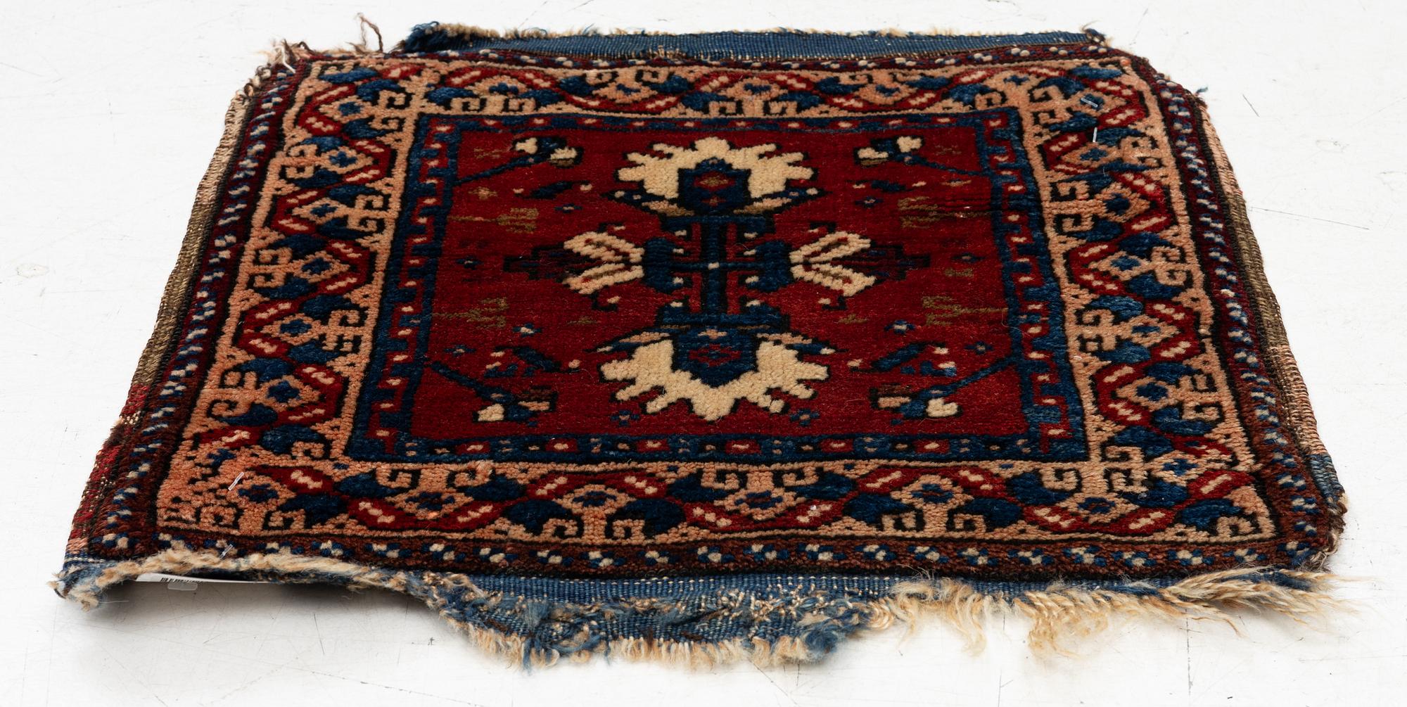 An Antique Saddlebag, so-called Heybe, Anatolia, c. 47 x 45 cm.