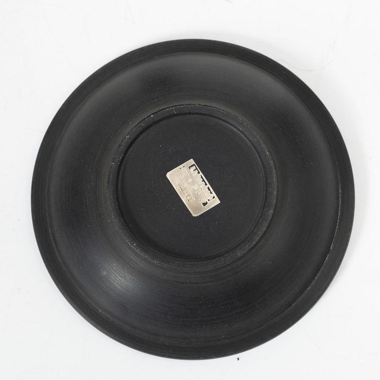 Five dishes, and one box with gaming chips, isolite with silver decor, Perstorp, Sweden, mid-20th century.