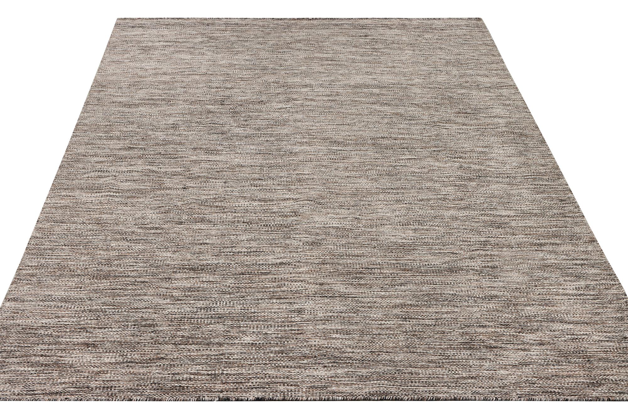 A flat weave carpet, c. 337 x 328 cm.