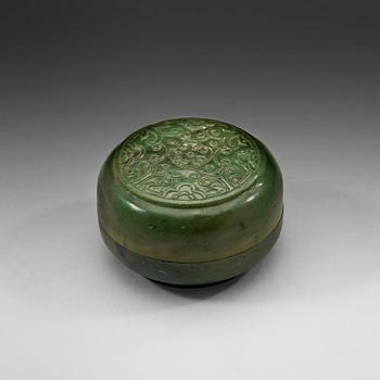 80. A carved nephrite box with cover, 20th Century.