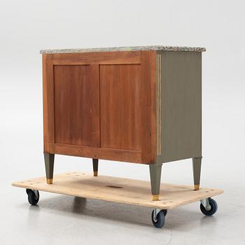 A painted Gustavians style chest of drawers with stone top, first part of the 20th Century.