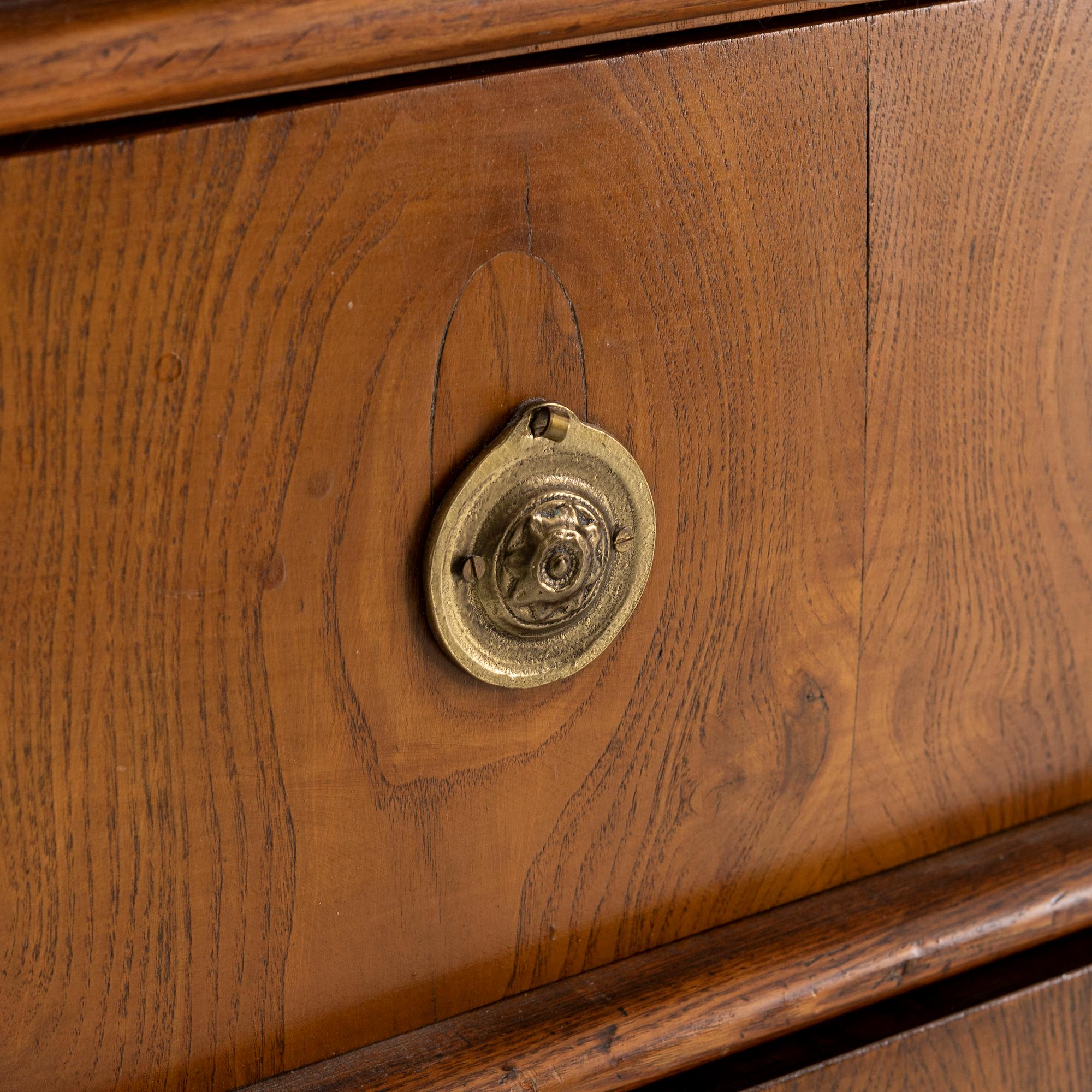 A Gustavian style oak veneered chest of drawers, around 1900.