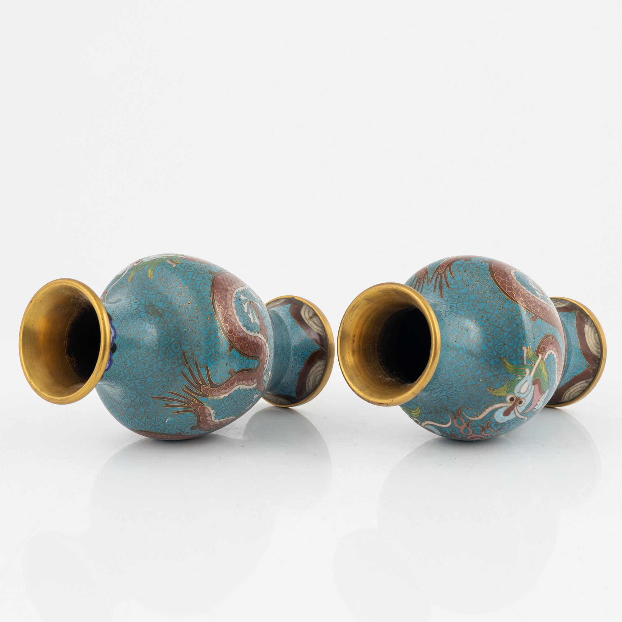 A silk clad box with two cloisonné vases, China early 20th Century.