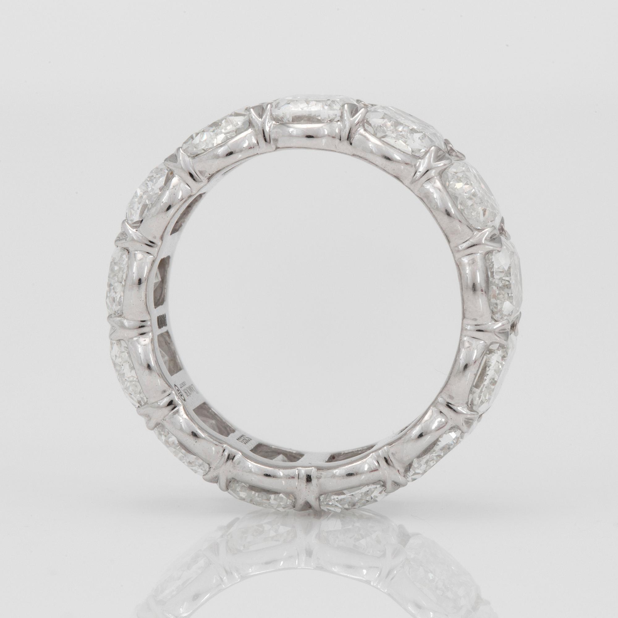 A circa 9.60ct Christopher designs, Uma, "L'amour" crisscut diamond eternity ring.