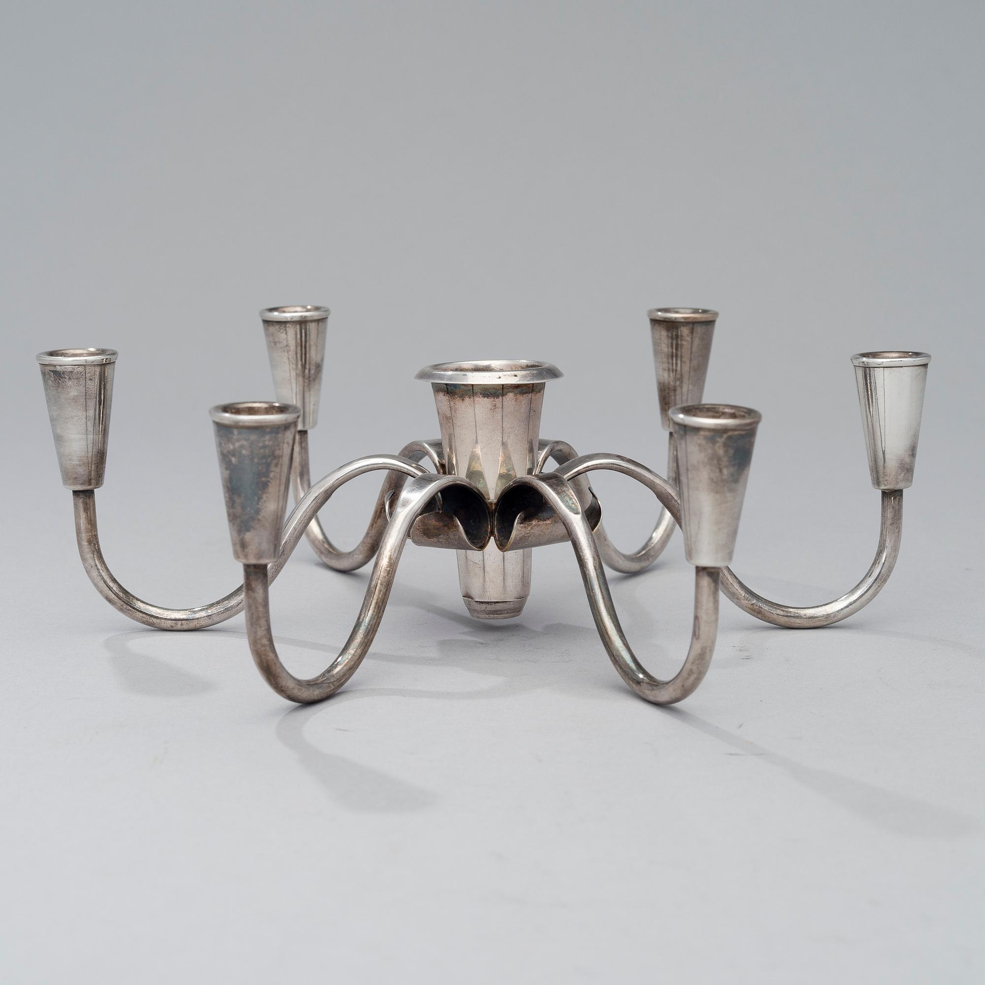 A pair of silver plated candelabra and a candelabrum, FDG, Denmark, mid 20th century.