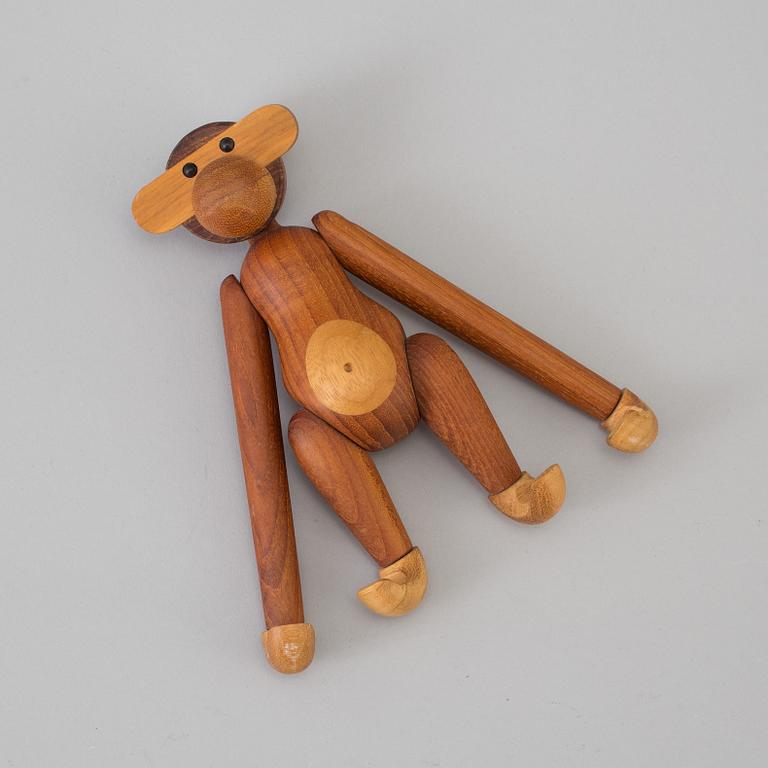 A Kay Bojesen wood figurine in the shape of a monkey.