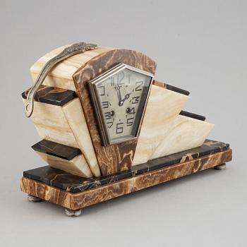 A three piece clock garniture, Art Deco style, 20th Century.