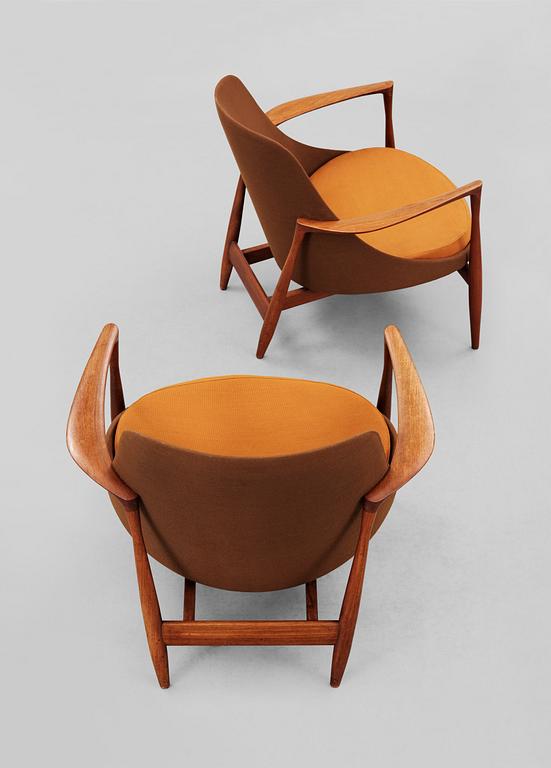 A pair of  Ib Kofoed Larsen "Elisabeth" teak easy chairs by Christensen & Larsen, Denmark 1950'-60's.