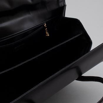 an Escada leather bag.