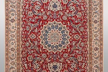A carpet, Nain, part silk, 9 Laa, ca 295 x 178 cm.