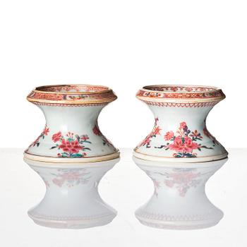 A pair of famille rose salts and a sauce boat, Qing dynasty, Qianlong (1736-95).