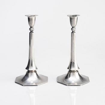 A pair of Swedish silver candlesticks, bearing the mark of GAB Stockholm, 1934.