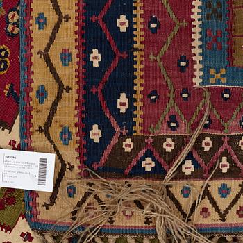 A KILIM, two parts, an antique Reyhanlı, south east Anatolia, ca 290,5 x 79,5 cm and ca 289 x 76 cm.