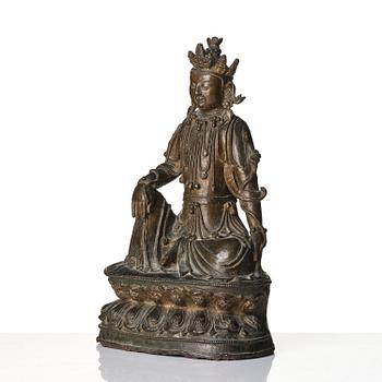 A bronze sculpture of Guanyin, Ming dynasty (1368-1644).