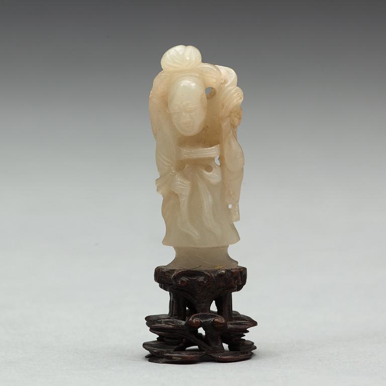 A nephrite cup and figurine, China, early 20th Century.