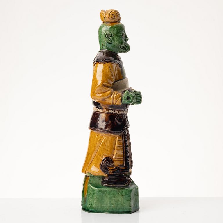 A stoneware figurine, China, Ming style but 20th century.