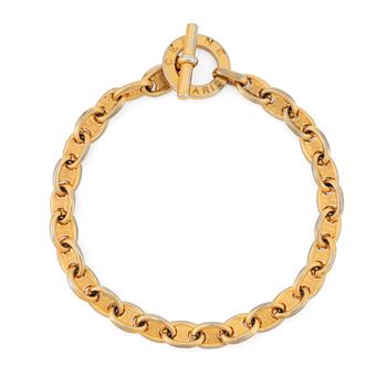 585. CÈLINE, a gold colored necklace.