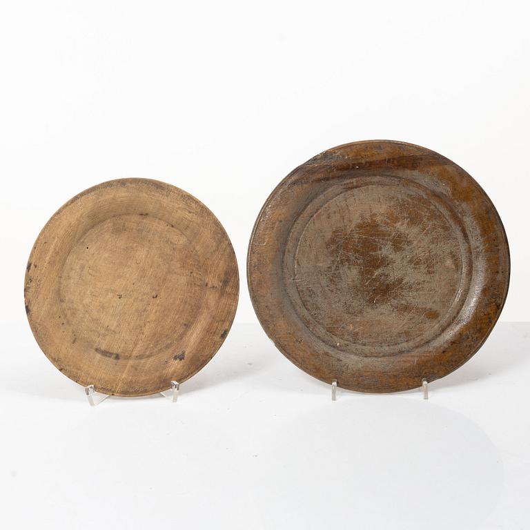 Twelve wooden plates, 19th Century.