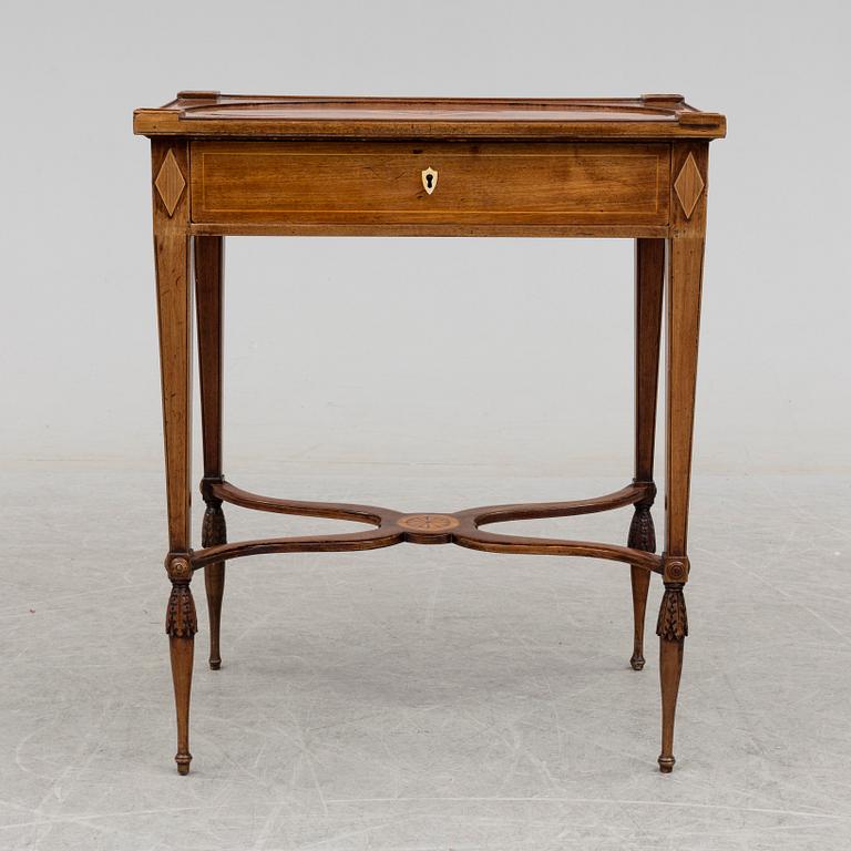 A circa 1800 table in the style of Lars Qvarnberg.