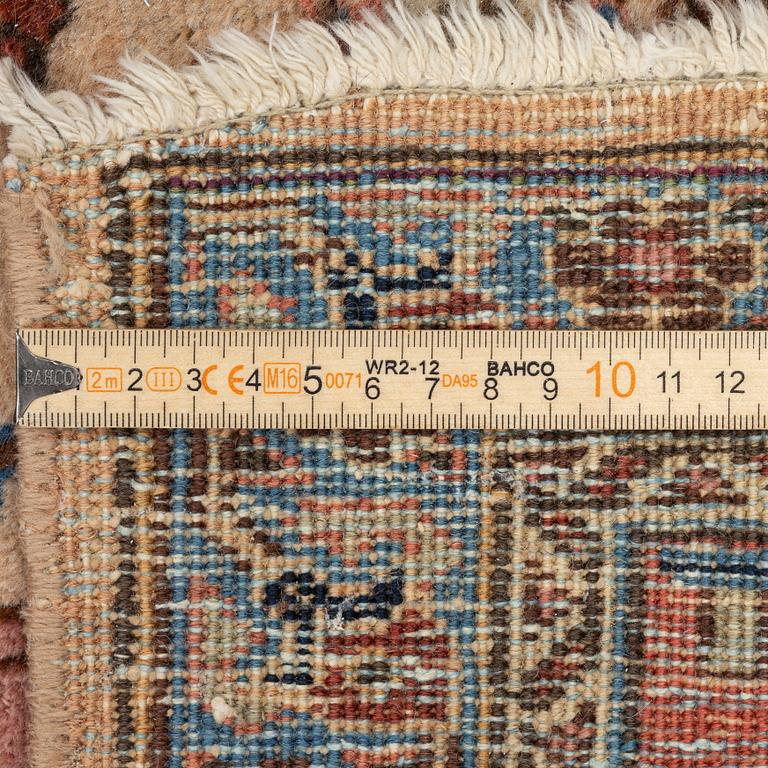 A semi antique Tabriz carpet, c. 290 x 195 cm.