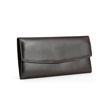 443. CHRISTIAN DIOR, a brown calf leather clutch / evening bag.