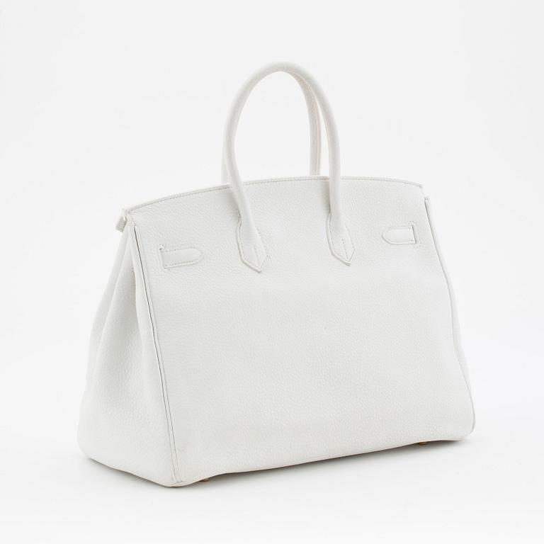 HERMÈS, a Tourillon clemence white handbag, "Birkin 35".