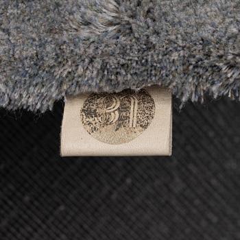 A carpet, Limited Edition, 'Cosmic Pasha', Belgium, c. 514 x 179 cm.