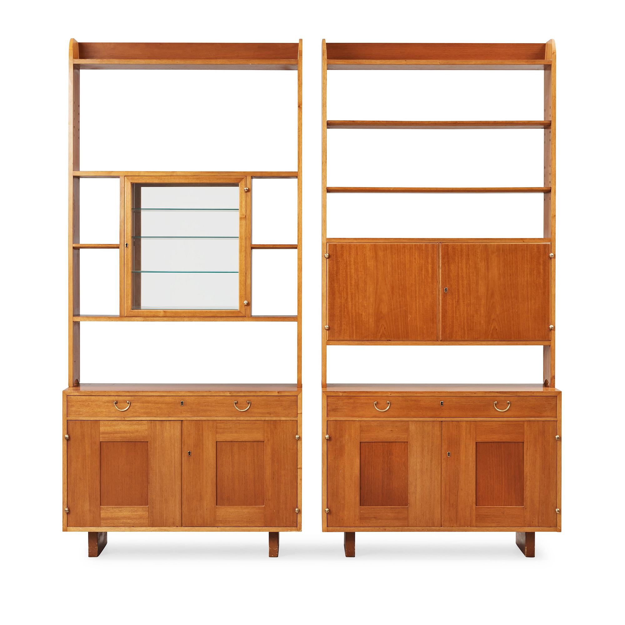 A set of two sections of Josef Frank mahogany book cases, Svenskt Tenn, model 2112.