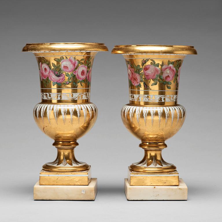 A pair of French urns, 19th Century.