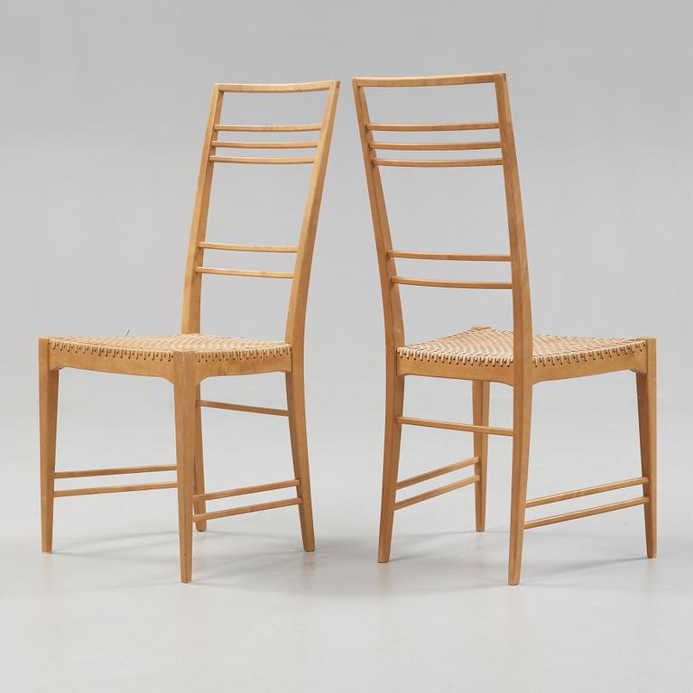 A set of six Erik Chambert 'Poem' birch and rattan dining chairs, Chambert's, Norrköping, Sweden, probably 1950's.