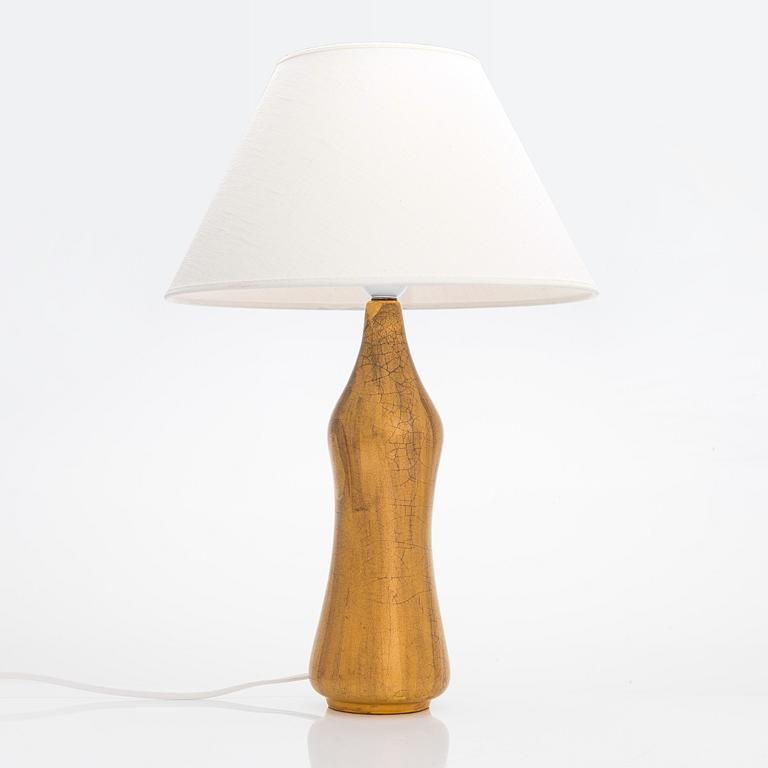 Toini Muona, a table lamp signed TM Arabia.