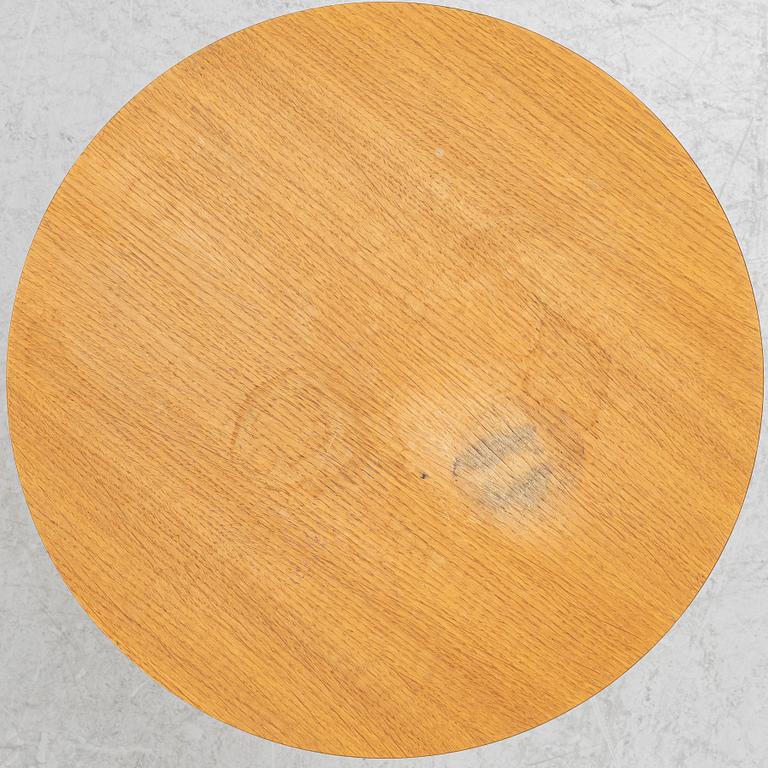 Yngve Ekström, a 'Lamino' armchair and sidetable, Swedese, Sweden, early 21st century.