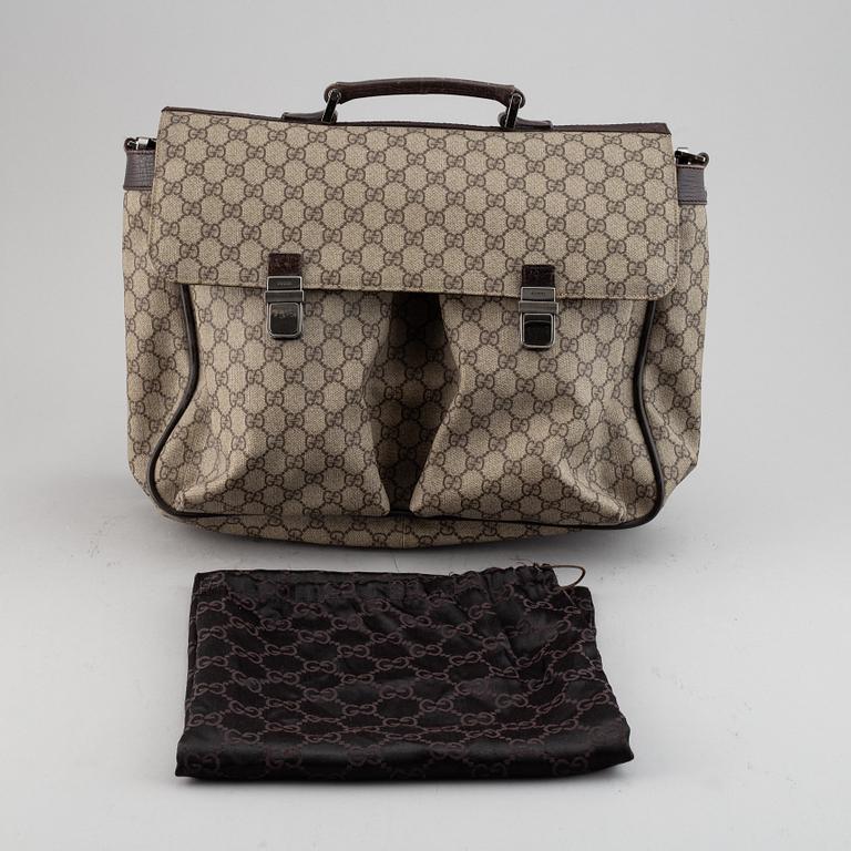 Gucci, a messenger bag.
