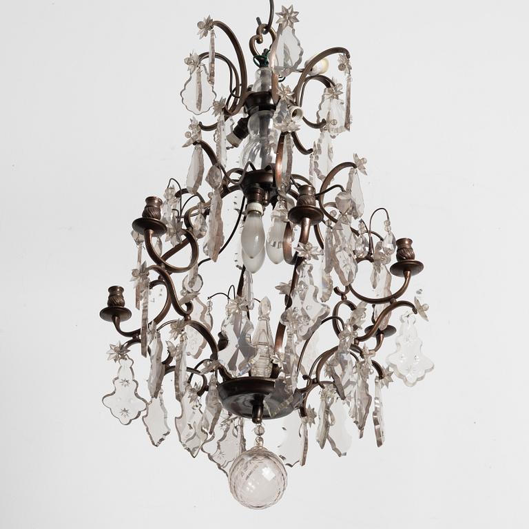 A Rococo style chandelier, early 20th century.