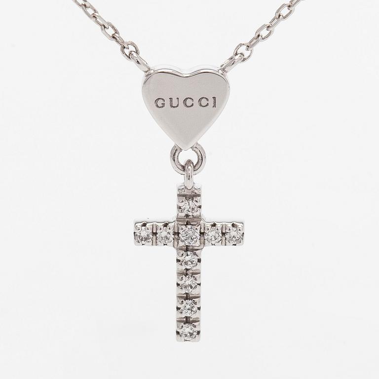 Gucci, an 18K white gold necklace with diamonds.