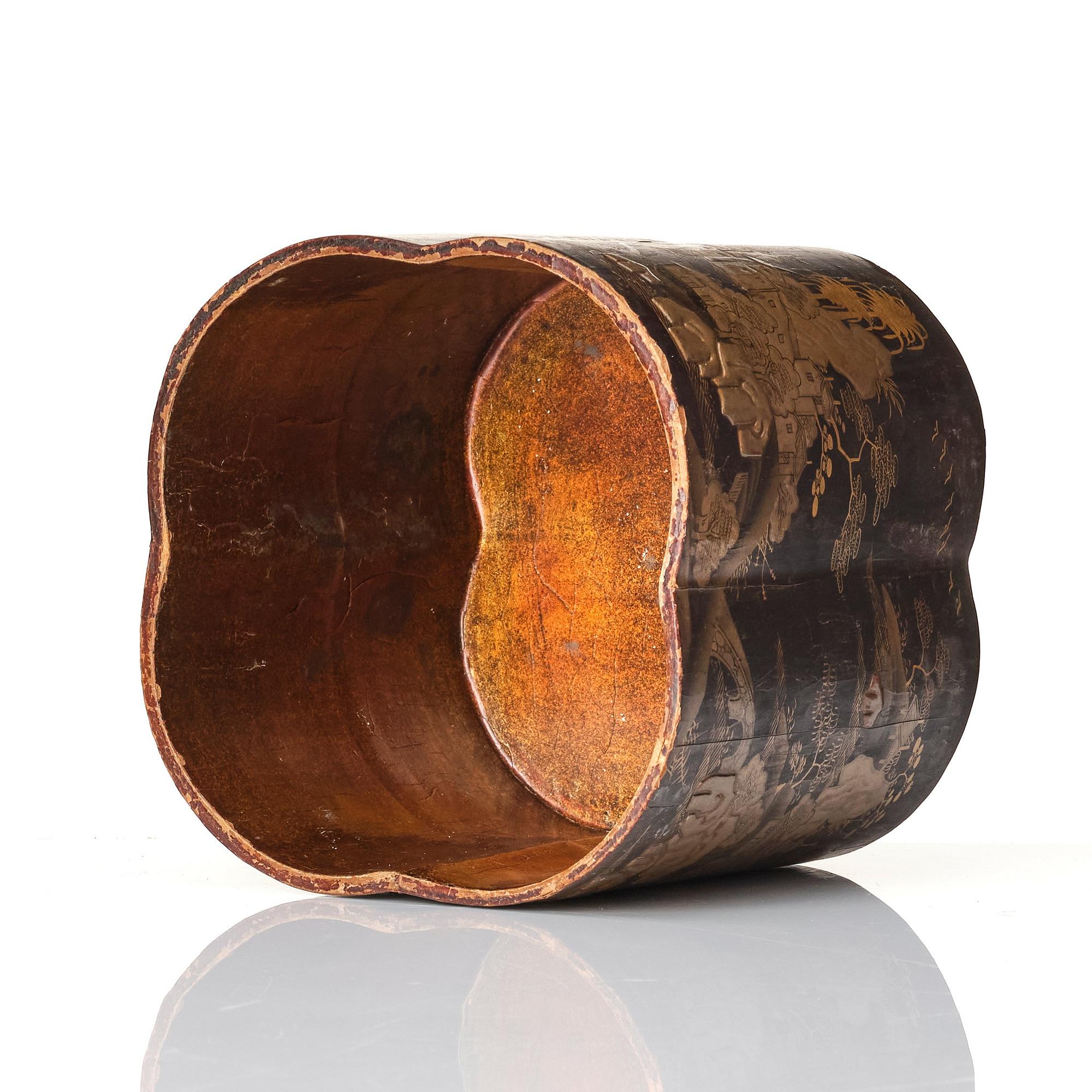 A Chinese lacquer box with a set of five pewter tea caddies, Qing dynasty, 18/19th Century.