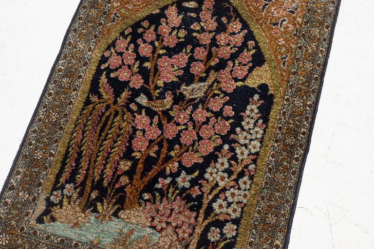 A semi-antique silk Ghom rug, central Iran, c. 32 x 23 in.
