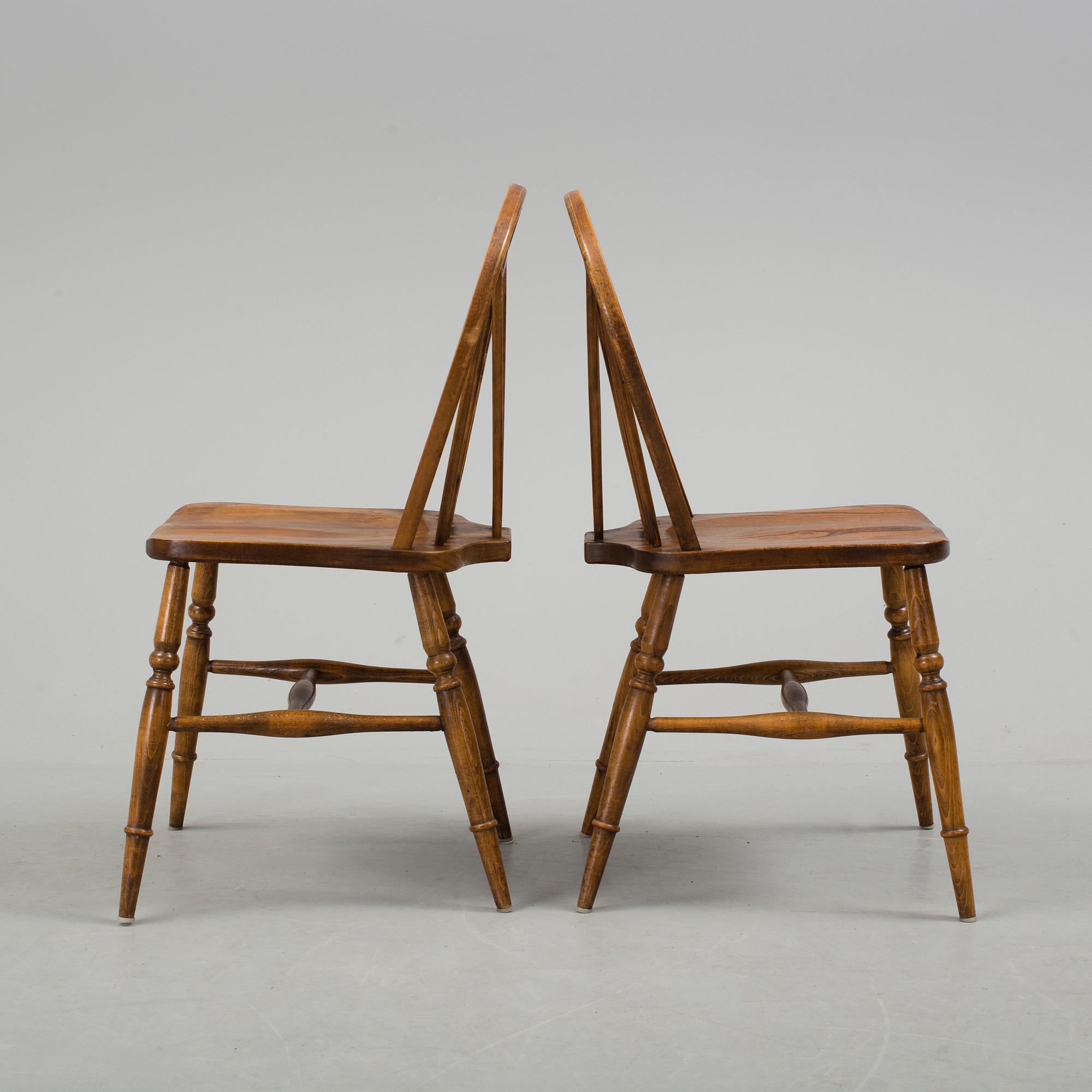 Six oak chairs from Reprodux, second half of the 20th century.