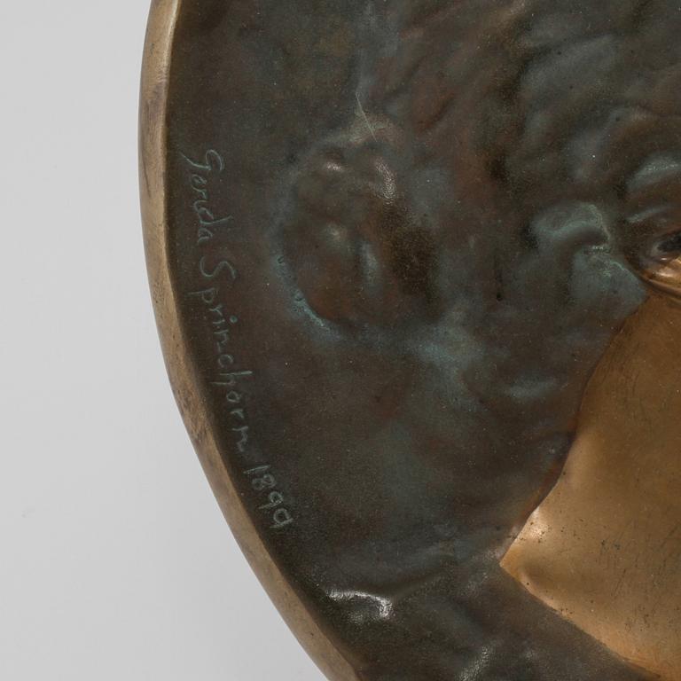 PLAKETT, brons, Gerda Sprinchorn, Ystad Brons, signerad och daterad 1899.