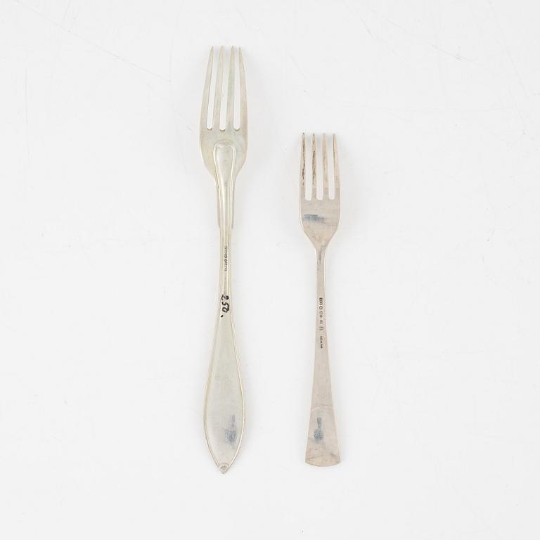 Eleven silver place forks and twelve silver sandwish forks, Sweden, 1917-1961.