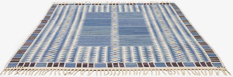 Barbro Nilsson, a carpet, 'Salerno blå', flat weave, c. 245 x 182 cm, signed AB MMF BN.